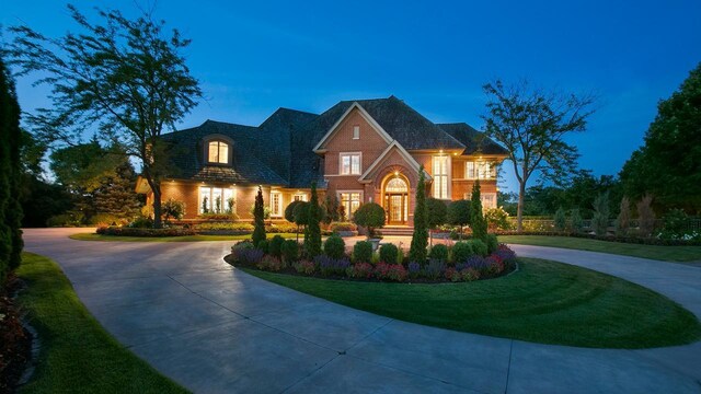 18313 Nicklaus Way, Eden Prairie, MN 55347 - view of front facade with curved driveway and brick siding