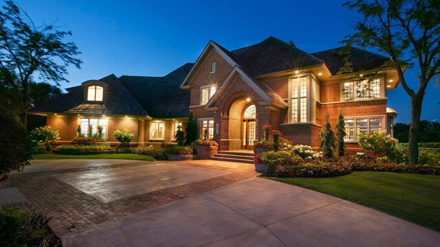 18313 Nicklaus Way, Eden Prairie, MN 55347 - view of front of house with french doors, brick siding, and a front lawn