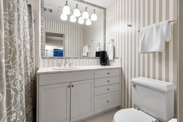 18313 Nicklaus Way, Eden Prairie, MN 55347 - bathroom featuring wallpapered walls, toilet, vanity, tile patterned floors, and a shower with curtain