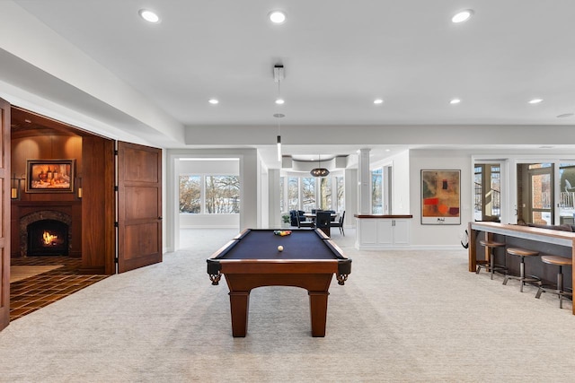 18313 Nicklaus Way, Eden Prairie, MN 55347 - rec room with light colored carpet, billiards, recessed lighting, baseboards, and a lit fireplace