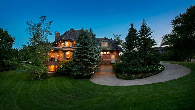 18313 Nicklaus Way, Eden Prairie, MN 55347 - back of property featuring a chimney and a lawn