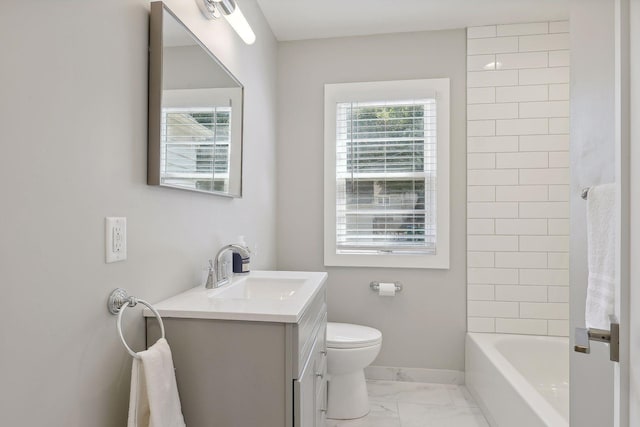 full bath with marble finish floor, shower / bathing tub combination, toilet, vanity, and baseboards