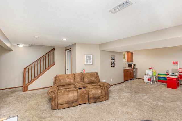 14371 Embry Path, Apple Valley, MN 55124 - living room with light colored carpet, baseboards, stairs, a textured ceiling, and recessed lighting
