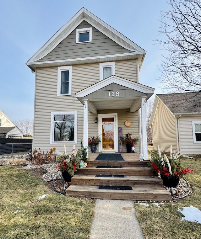 view of front facade with a porch and a front yard