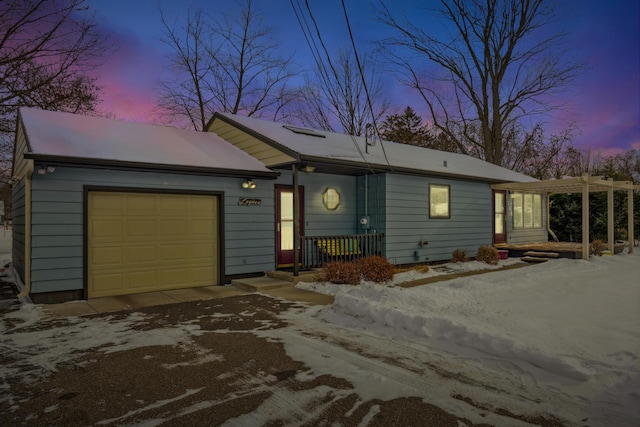 ranch-style home with a garage