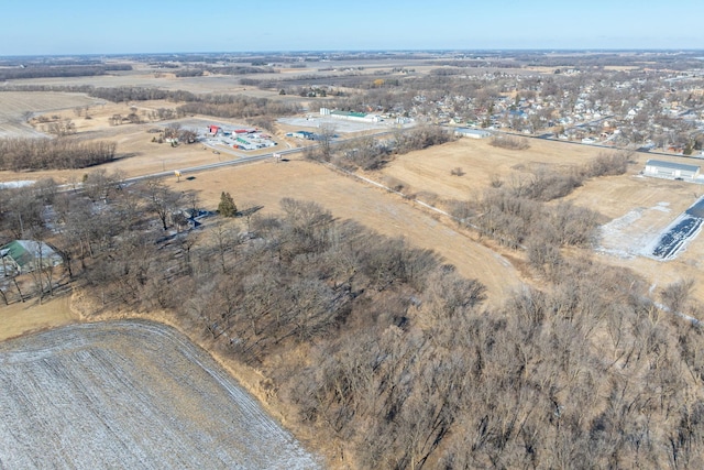 birds eye view of property featuring a rural view