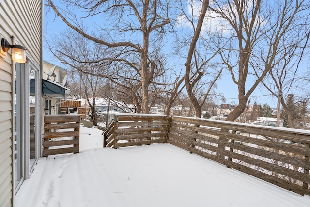 view of yard covered in snow