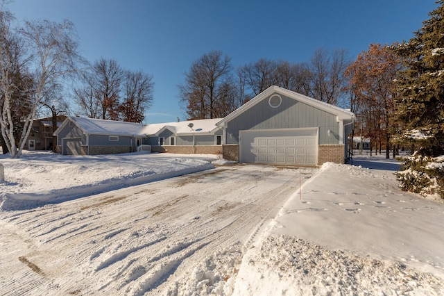 single story home featuring a garage