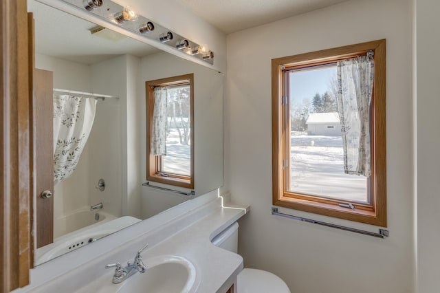 full bathroom with toilet, shower / bath combo, and vanity