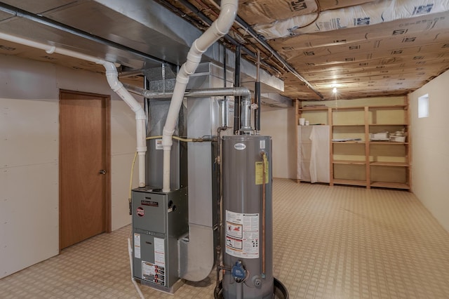 utility room featuring water heater