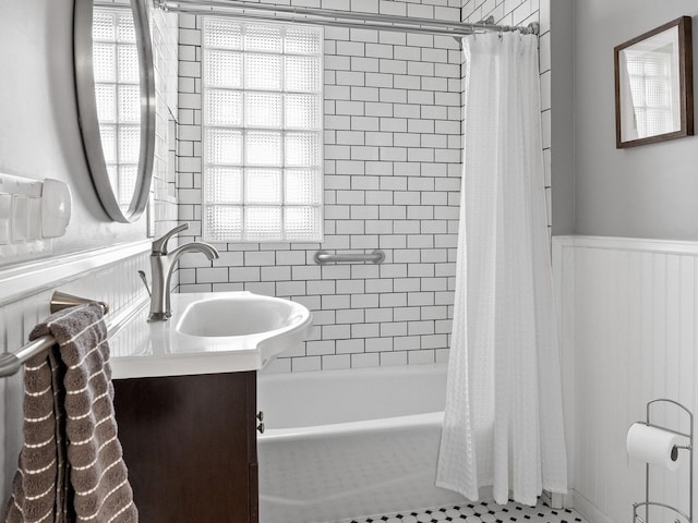 bathroom featuring vanity and shower / tub combo