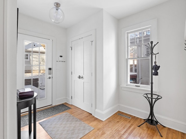 foyer entrance featuring light hardwood / wood-style floors