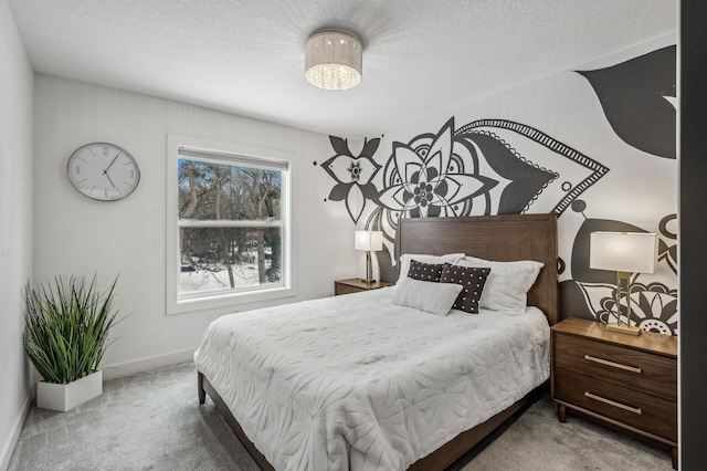 carpeted bedroom with a textured ceiling