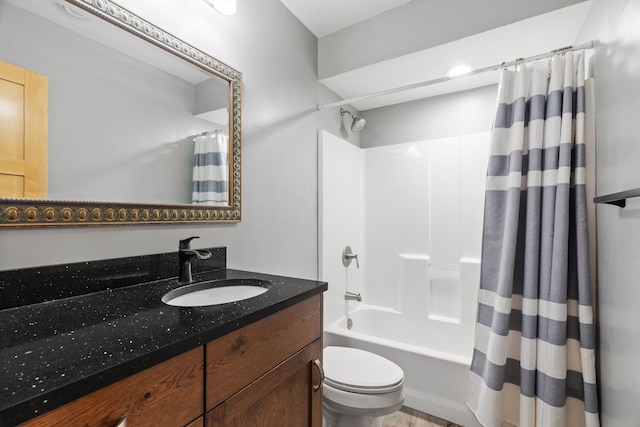 full bathroom with shower / tub combo, vanity, and toilet