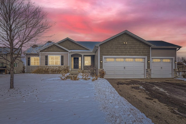 view of front of home with a garage