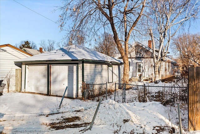 view of snow covered garage