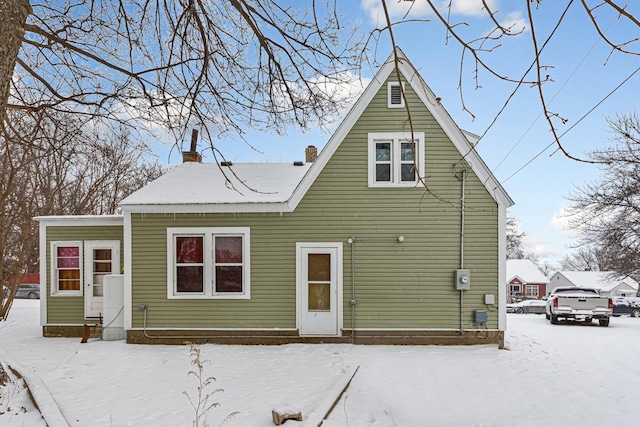 view of snow covered property