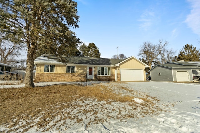 ranch-style home featuring a garage