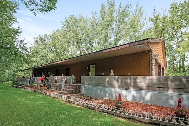 view of property exterior featuring a yard