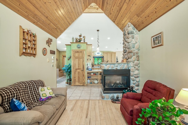 living room featuring high vaulted ceiling, a fireplace, wood ceiling, and light hardwood / wood-style floors