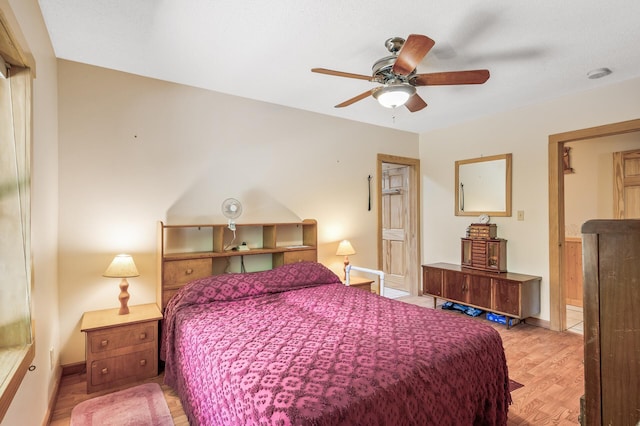 bedroom featuring ceiling fan and light hardwood / wood-style floors