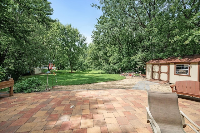 view of patio featuring a storage unit