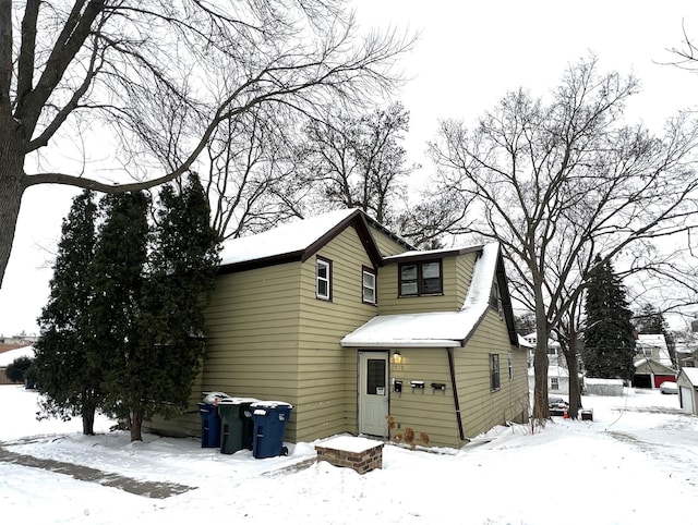 view of snow covered house