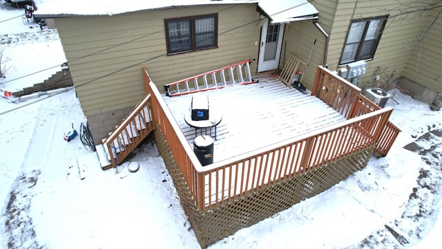 snow covered deck with cooling unit