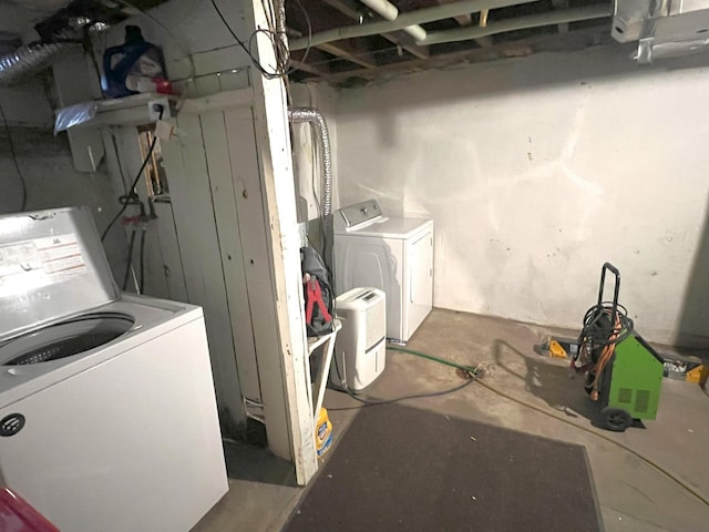 basement with separate washer and dryer