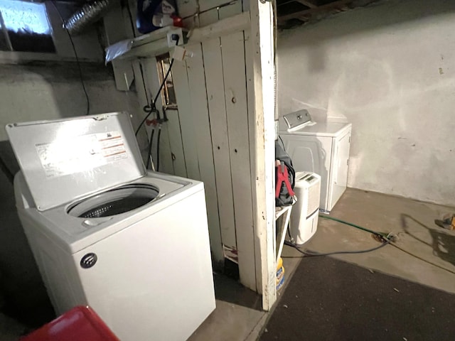 laundry area with independent washer and dryer