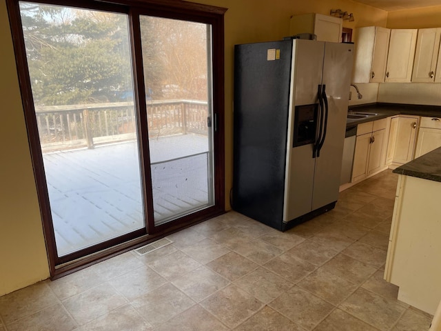 kitchen featuring stainless steel appliances and sink