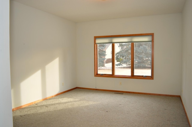 view of carpeted spare room