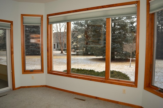 view of unfurnished sunroom