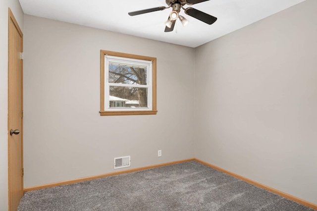 carpeted empty room with ceiling fan