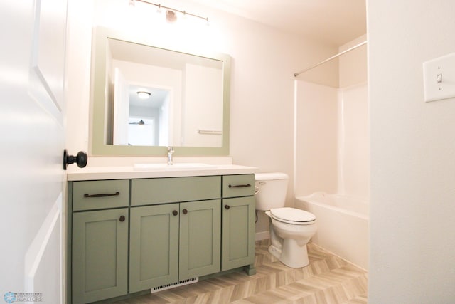 full bathroom with shower / tub combination, vanity, and toilet