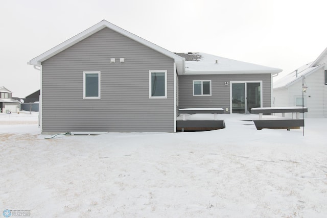 view of snow covered house