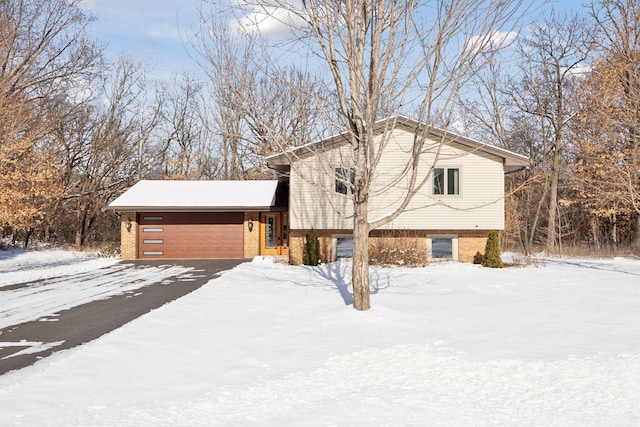 split level home featuring a garage