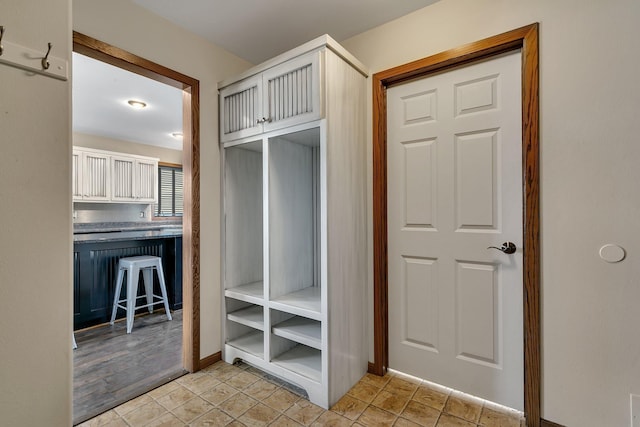 mudroom with light tile patterned floors