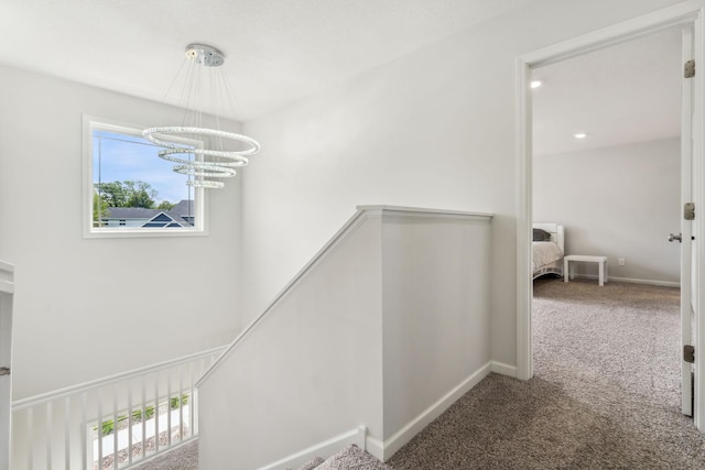 18338 Dove Ct, Eden Prairie, MN 55347 - hall with carpet flooring and a chandelier
