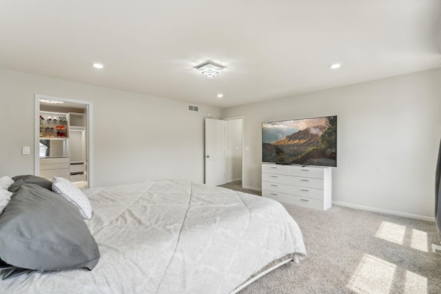18338 Dove Ct, Eden Prairie, MN 55347 - carpeted bedroom featuring a walk in closet