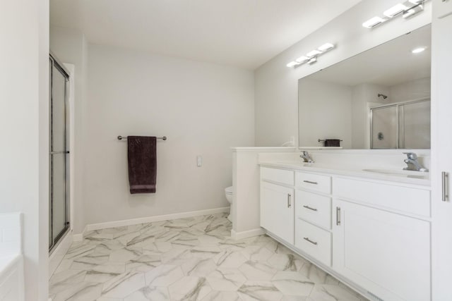 18338 Dove Ct, Eden Prairie, MN 55347 - bathroom featuring vanity, toilet, and an enclosed shower
