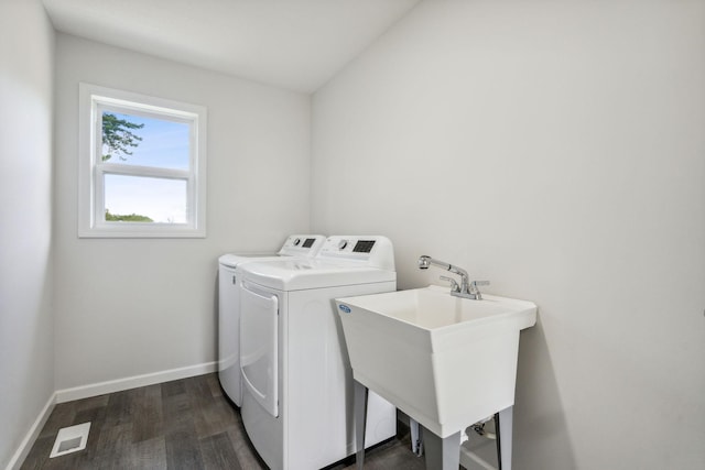 18338 Dove Ct, Eden Prairie, MN 55347 - clothes washing area with dark hardwood / wood-style flooring, sink, and washer and dryer