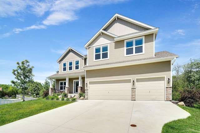 18338 Dove Ct, Eden Prairie, MN 55347 - craftsman-style house with a garage, a front yard, and covered porch