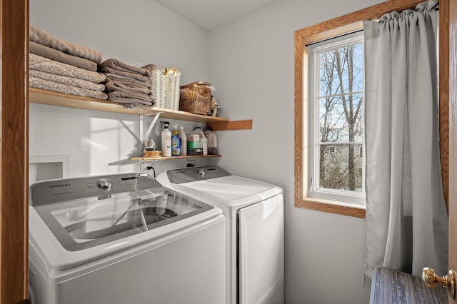 washroom with washer and clothes dryer