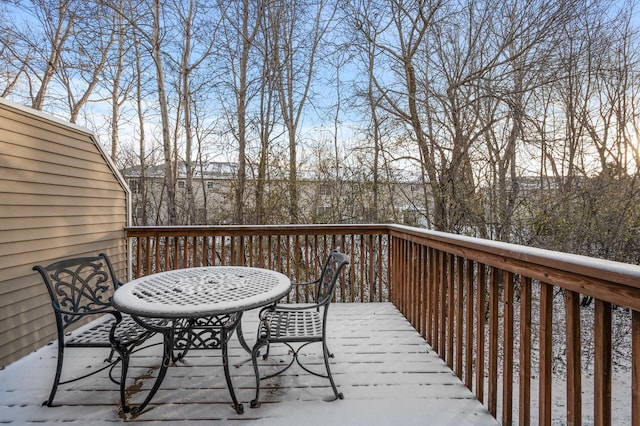 view of snow covered deck