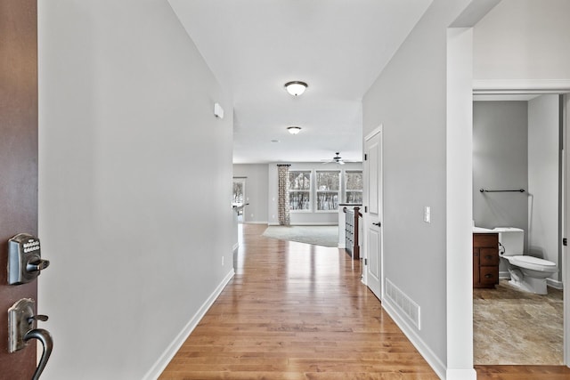 hall featuring light wood-type flooring