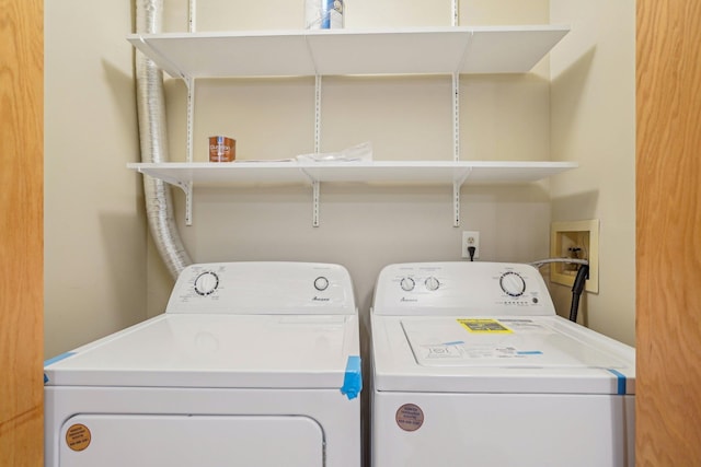 laundry area with washer and dryer