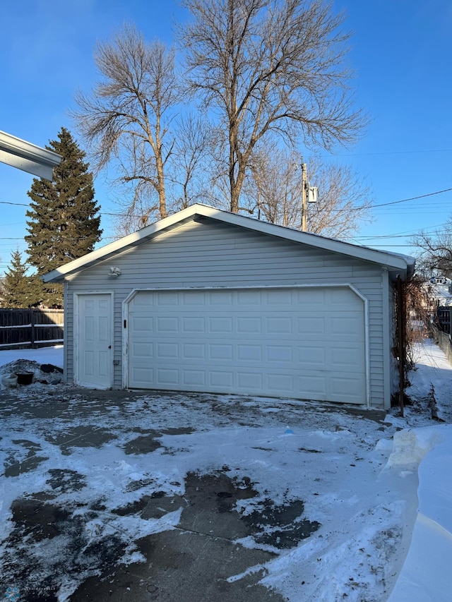 view of snow covered garage