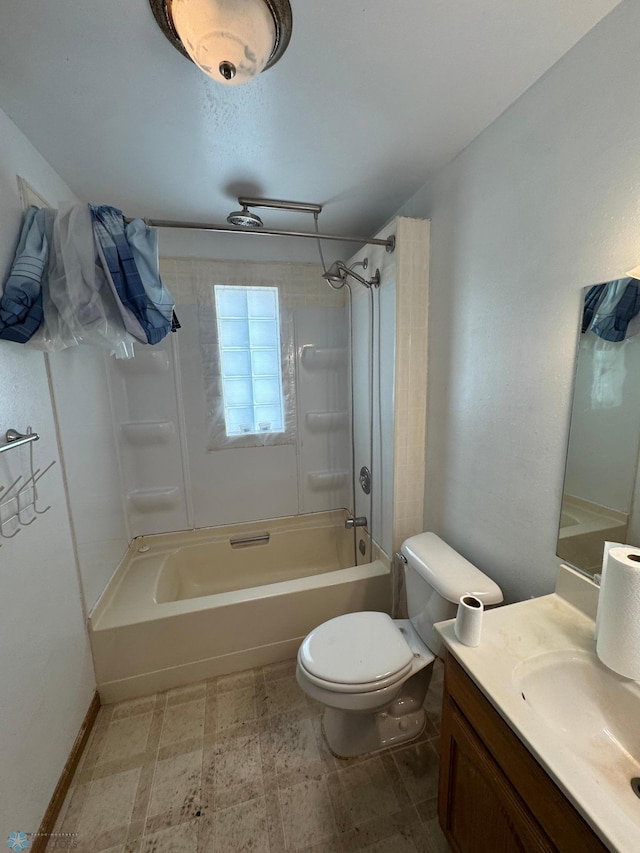 full bathroom with vanity, toilet, and tiled shower / bath combo