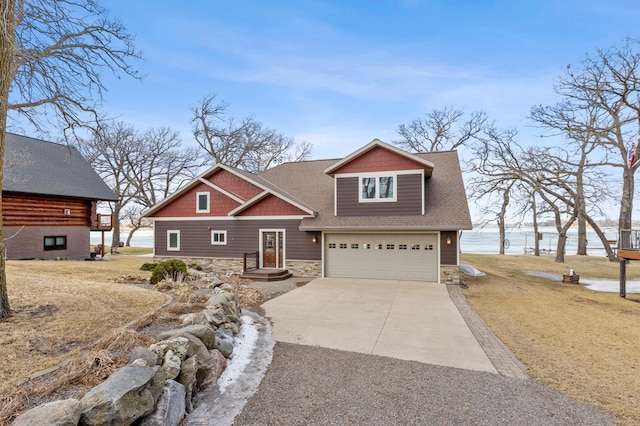 craftsman inspired home with stone siding, roof with shingles, concrete driveway, and an attached garage